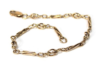 Lot 583 - A 9ct yellow gold fancy link bracelet with...