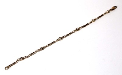 Lot 583 - A 9ct yellow gold fancy link bracelet with...
