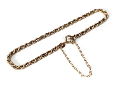 Lot 584 - A 9ct two-colour gold ropetwist bracelet, l....