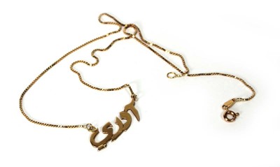Lot 585 - A yellow metal boxlink necklace suspending a...