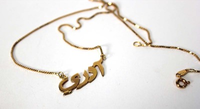 Lot 585 - A yellow metal boxlink necklace suspending a...