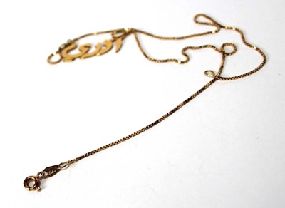 Lot 585 - A yellow metal boxlink necklace suspending a...
