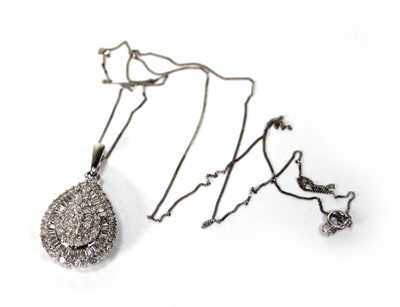 Lot 589 - A 9ct white gold fine flat curblink necklace...