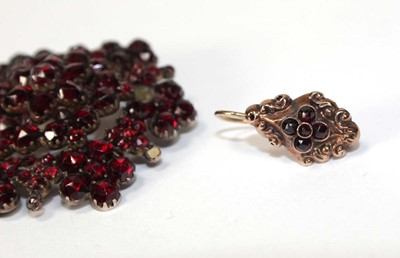 Lot 590 - A pair of yellow metal ear pendants of...