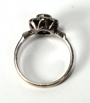 Lot 591 - An 18ct white gold cluster ring set small...