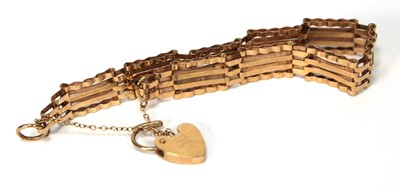 Lot 593 - A 9ct yellow gold four bar gatelink bracelet...