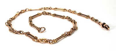 Lot 595 - A rose/yellow gold fancy link necklace with...