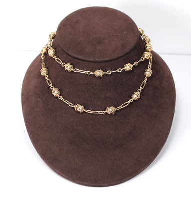 Lot 601 - A 9ct yellow gold bead necklace of Eastern...