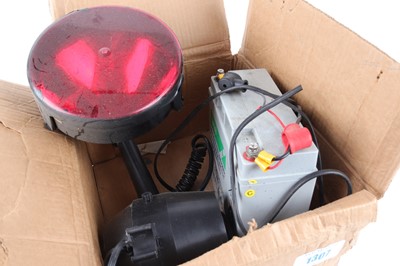 Lot 1307 - Lamp and battery