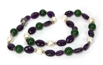 Lot 607 - A single strand bead necklace set cultured...