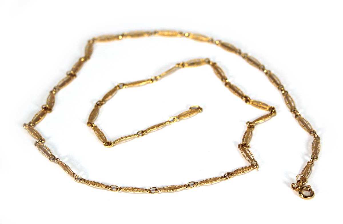 Lot 609 - An 18ct yellow gold fancy oval link necklace,...