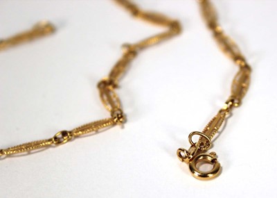 Lot 609 - An 18ct yellow gold fancy oval link necklace,...