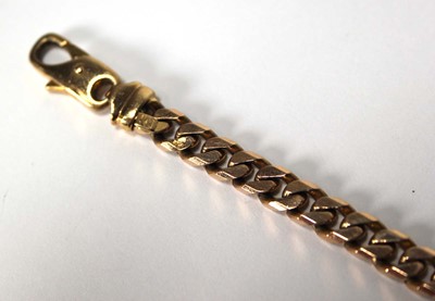 Lot 613 - A 9ct yellow gold flat curblink bracelet with...