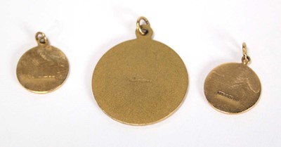 Lot 616 - Three 9ct yellow gold pendants comprising two...