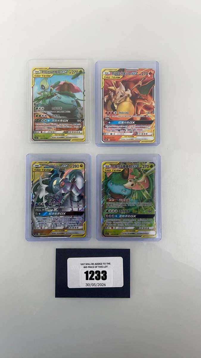 Lot 1233 - (4) Top Loaded Chinese Pokémon TCG Tag Team...