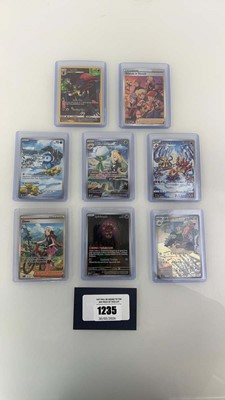 Lot 1235 - (8) Top Loaded English/Japanese Pokémon TCG...
