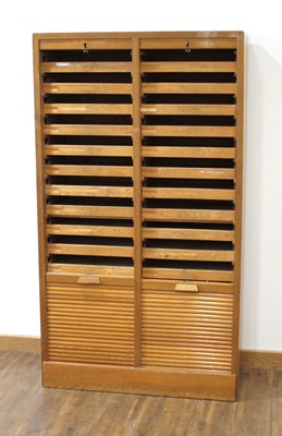 Lot 1 - A 1950/60's oak double-tambour cabinet with...