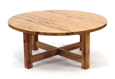 Lot 9 - A Scandinavian circular pine coffee table on...