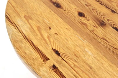 Lot 9 - A Scandinavian circular pine coffee table on...