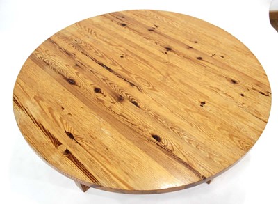 Lot 9 - A Scandinavian circular pine coffee table on...