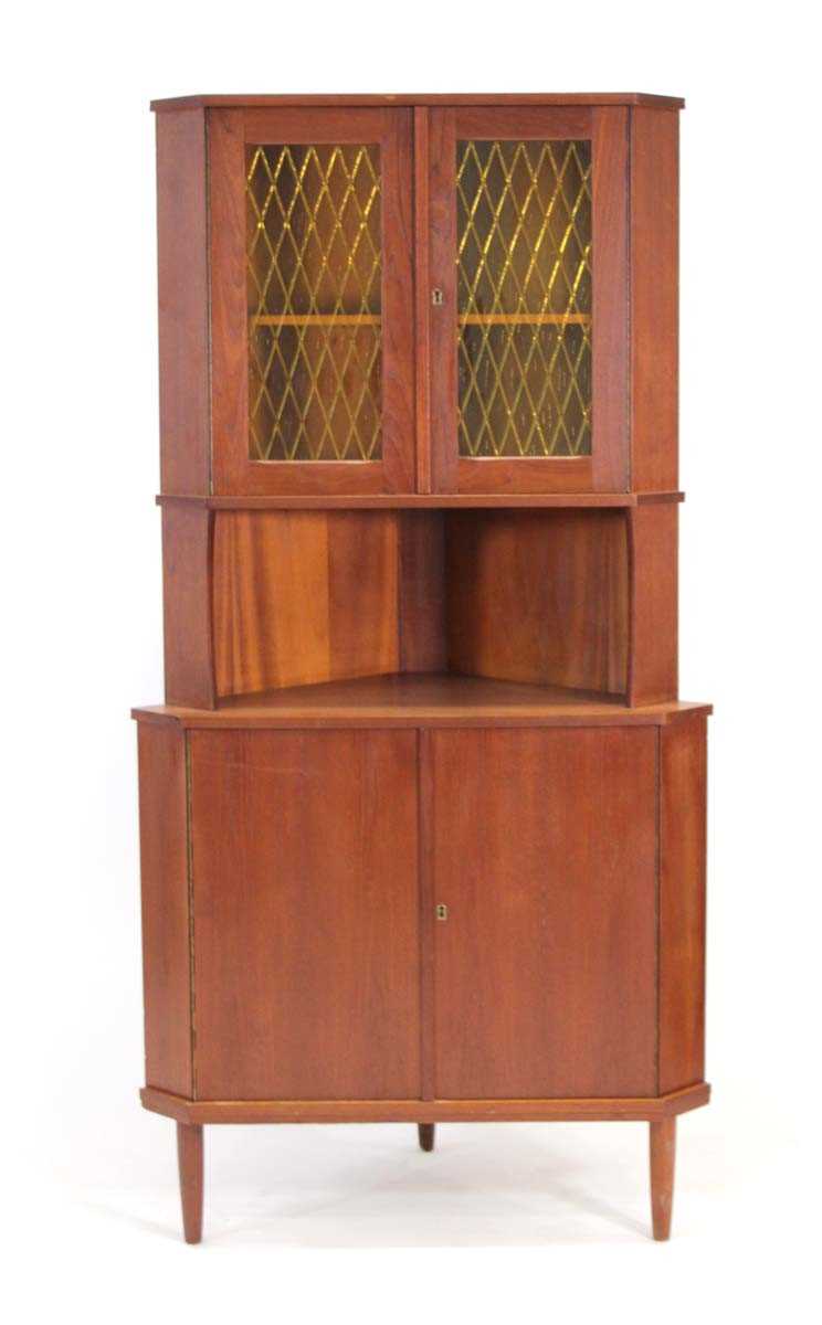 Lot 57 - A 1960's Danish teak corner cabinet with two...