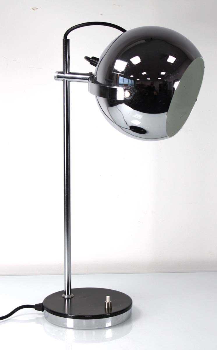 Lot 91 - A 1970's chromed 'eyeball' lamp on a straight...