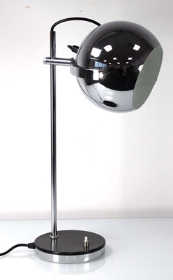 Lot 91 - A 1970's chromed 'eyeball' lamp on a straight...