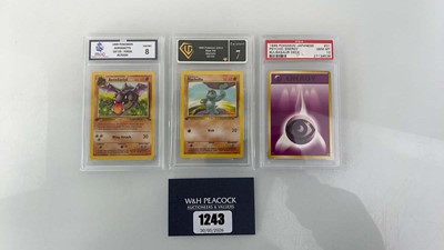Lot 1243 - (3) 1999 Pokémon Fossil 1st Edition #016 -...