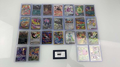 Lot 1402 - Approx. 25 Top Loaded Pokémon cards from...