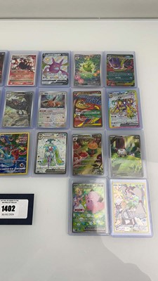 Lot 1402 - Approx. 25 Top Loaded Pokémon cards from...