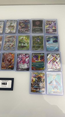 Lot 1403 - Approx. 25 Top Loaded Pokémon cards from...