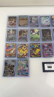Lot 1404 - Approx. 25 Top Loaded Pokémon cards from...