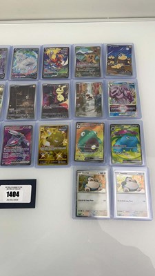 Lot 1404 - Approx. 25 Top Loaded Pokémon cards from...