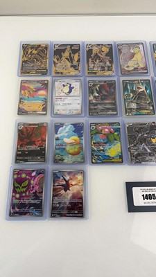 Lot 1405 - Approx. 25 Top Loaded Pokémon cards from...