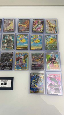 Lot 1405 - Approx. 25 Top Loaded Pokémon cards from...