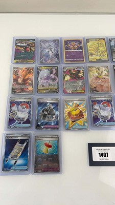 Lot 1407 - Approx. 25 Top Loaded Pokémon cards from...
