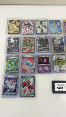 Lot 1408 - Approx. 25 Top Loaded Pokémon cards from...