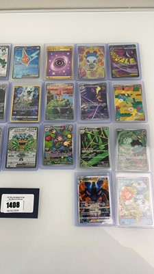 Lot 1408 - Approx. 25 Top Loaded Pokémon cards from...