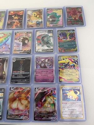 Lot 1410 - Approx. 25 Top Loaded Pokémon cards from...