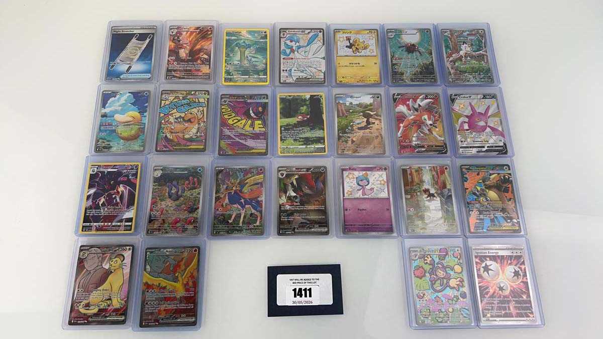 Lot 1411 - Approx. 25 Top Loaded Pokémon cards from...