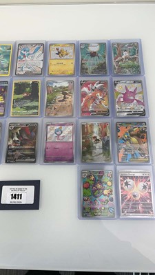 Lot 1411 - Approx. 25 Top Loaded Pokémon cards from...