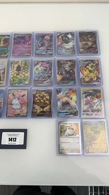 Lot 1412 - Approx. 25 Top Loaded Pokémon cards from...