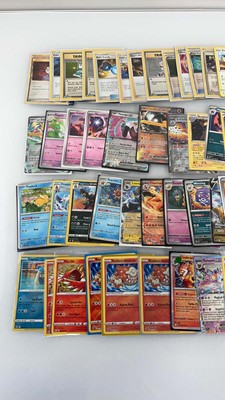 Lot 1453 - Approx. 100 Sleeved Pokémon cards from various...