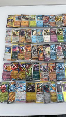 Lot 1455 - Approx. 100 Sleeved Pokémon cards from various...