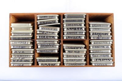 Lot 1684 - Box with 41 tins containing firing pins,...