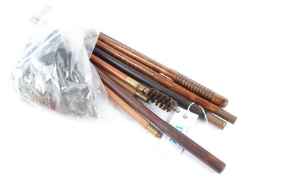 Lot 1322 - Five shotgun cleaning rods and associated...