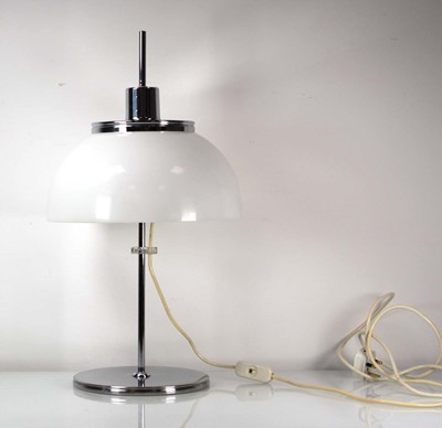 Lot 140 - In the manner of Guzzini, a chrome table lamp...
