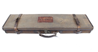 Lot 1457 - Canvas and leather gun case with blue baize...