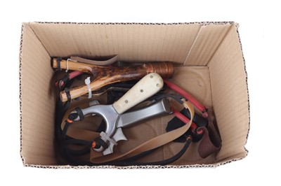 Lot 1058 - Four catapults