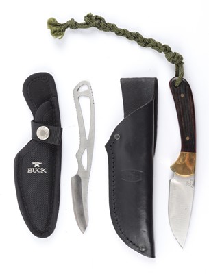 Lot 77 - Two Buck sheath knives: 113 and 135